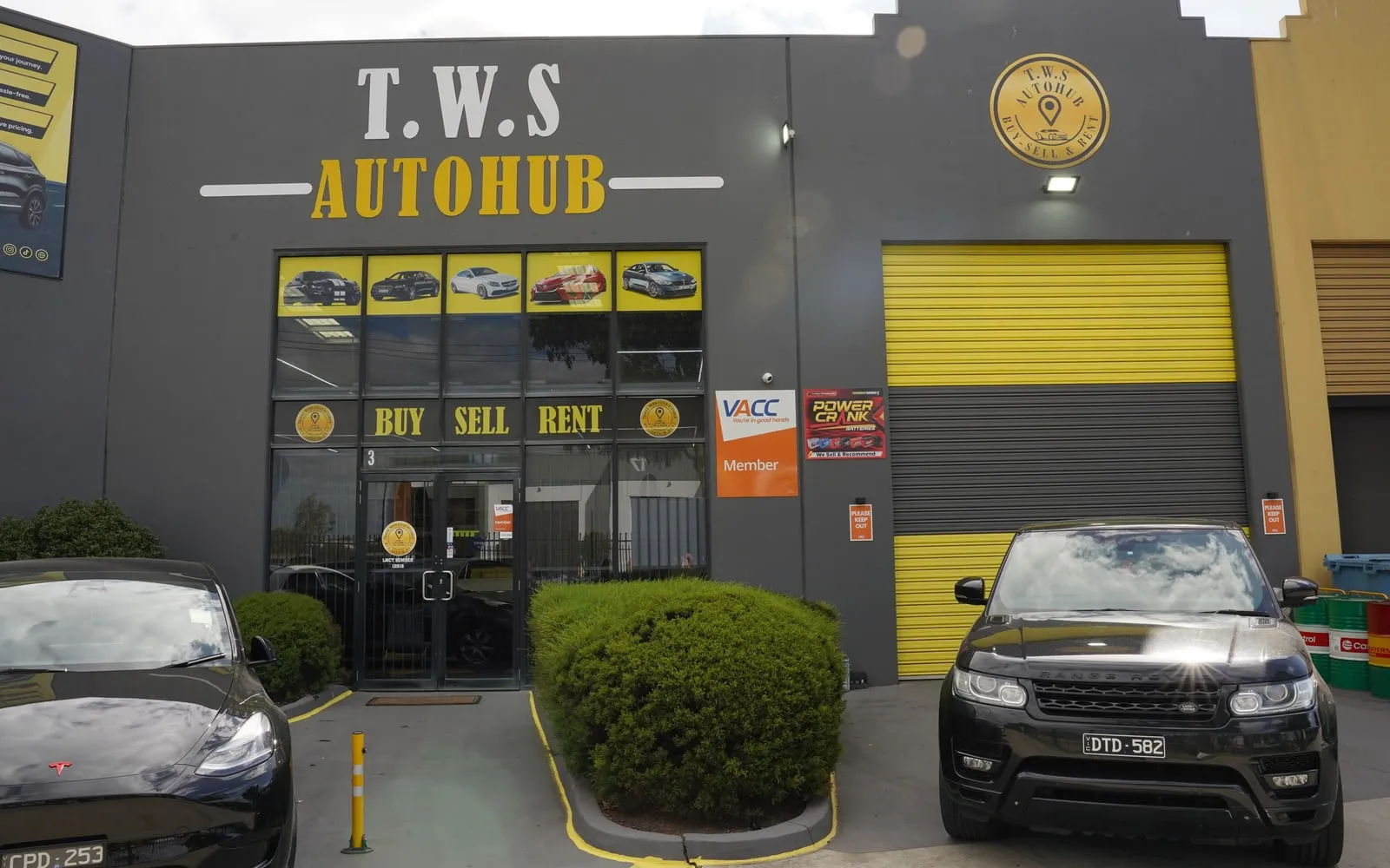 The TWS AutoHub shopfront with stock parked out front