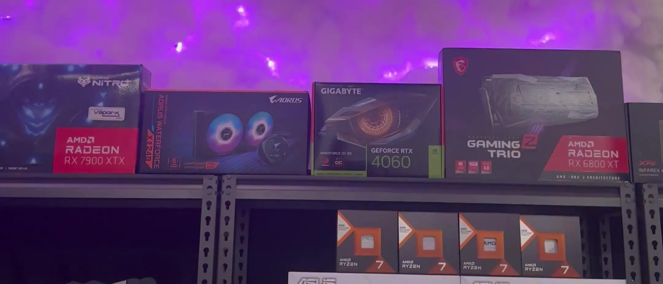 Shelves of boxed graphics cards in a PC retailer’s showroom